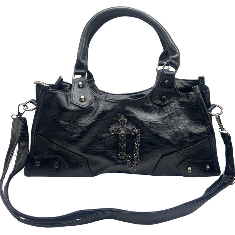Black soft faux leather gothic tote bag with ornate metal cross, hanging chain, studded panels, carry handles and adjustable shoulder strap.