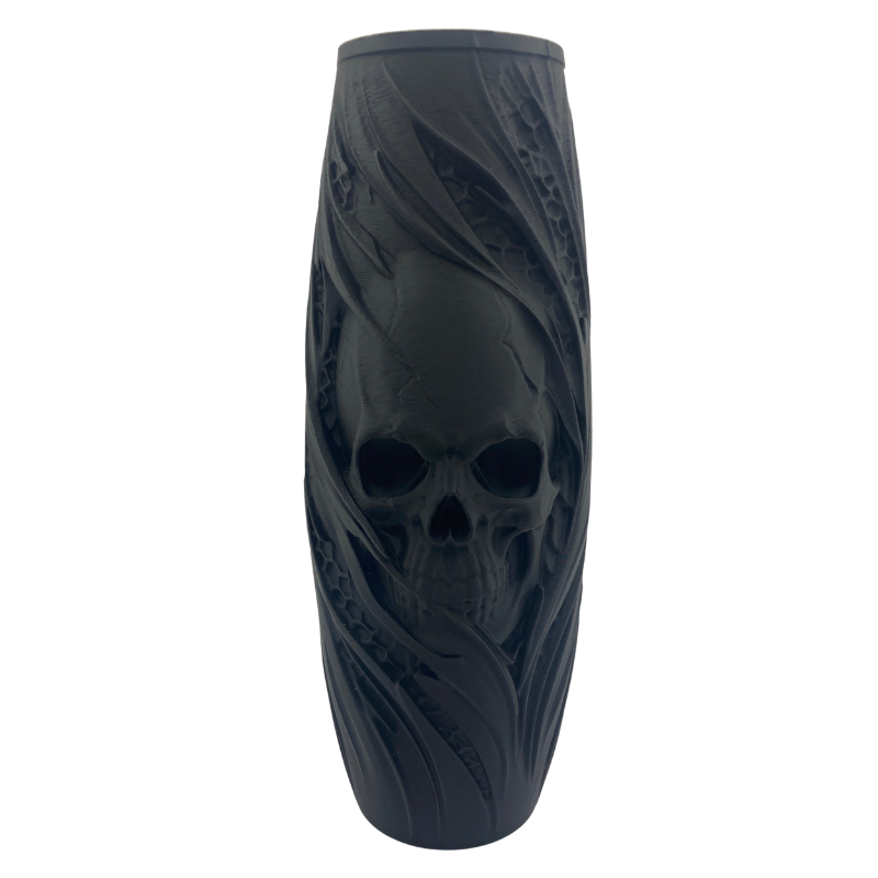Matte black 3D printed skull case with detailed skull face and flowing design. Gothic home decor and dark academia vase.