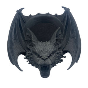 Matte black 3D printed vampire bat trinket tray with detailed bat head and wings. Gothic jewellery dish and home decor.