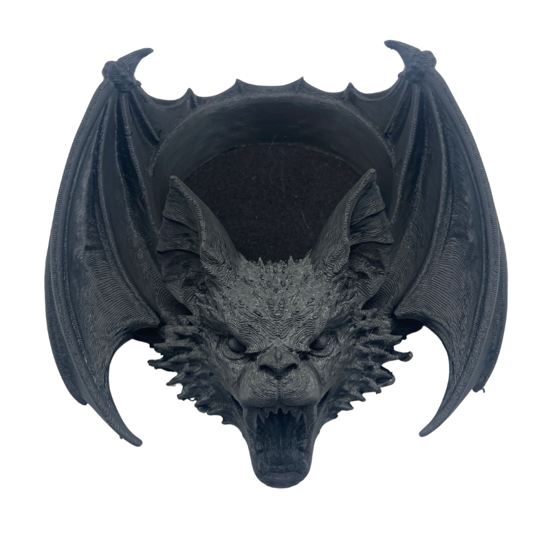 Matte black 3D printed vampire bat trinket tray with detailed bat head and wings. Gothic jewellery dish and home decor.