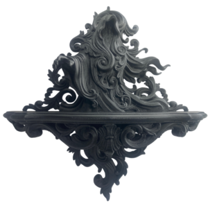 3d printed black matte wraith shelf with an outstretched hand which is surrounded by intricate baroque scrollwork. Features a functional shelf for small crystals or decor.