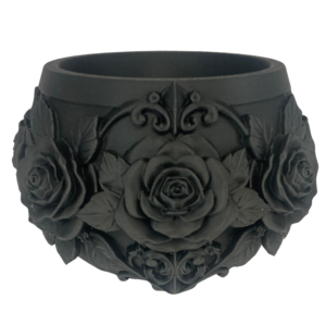 Black 3D printed rose plant pot holder featuring beautifully detailed black roses. Unique statement décor for alternative homes and plant lovers.