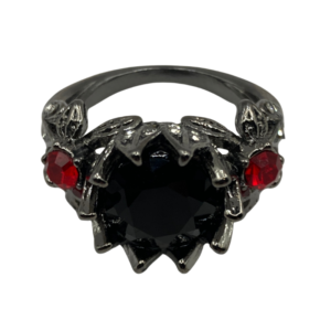 The black magic ring features a central black stone, with two red stones on either side.
