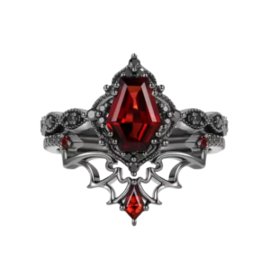 The Ruby Flutter ring consists of two black metalband with red stones. View our collection of gothic red-stone rings inspired by Victorian and vintage designs. Crafted from mixed alloys with synthetic gemstones, these statement pieces add bold elegance to any gothic or alternative look.