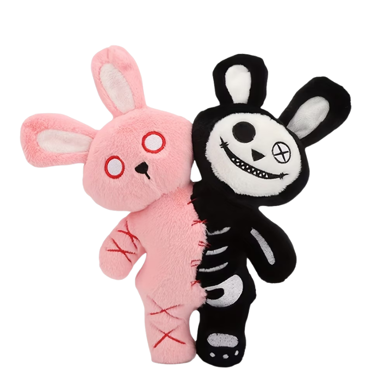 The two-headed bunny plush features a soft pink side and an evil grinning dark side in black - creepy but definitely cute!